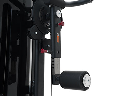 Close-up of a Insight Fitness Multi Hip - SA017 with black and red components on a white background