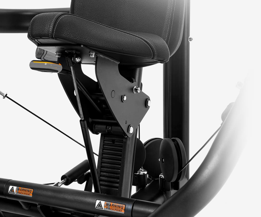 Close-up of a Insight Fitness ISO Lateral Chest Press - BE8001 with a seat and frame details on a white background