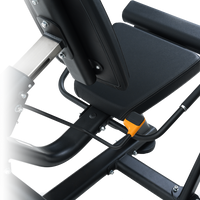 Thumbnail for Close-up of a Insight Fitness Leg Curl/Extension - BE8025 seat with an orange component on a white background
