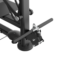 Thumbnail for Close-up of a black metal frame with adjustable levers on a white background