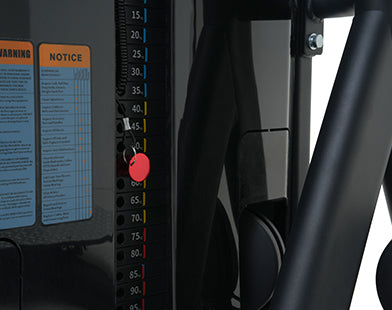 Close-up of Insight Fitness Multi Hip - SA017 with a digital display and warning label.