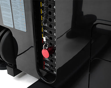 Close-up of a Insight Fitness Rotary Torso - SAO10 control panel with buttons and labels on a dark background