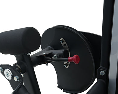 Close-up of a Insight Fitness SA Series Leg Extension - SA014D with a red lever on a white background